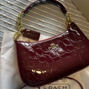 Coach Burgundy Patent Leather Mini Crossbody with Gold Hardware